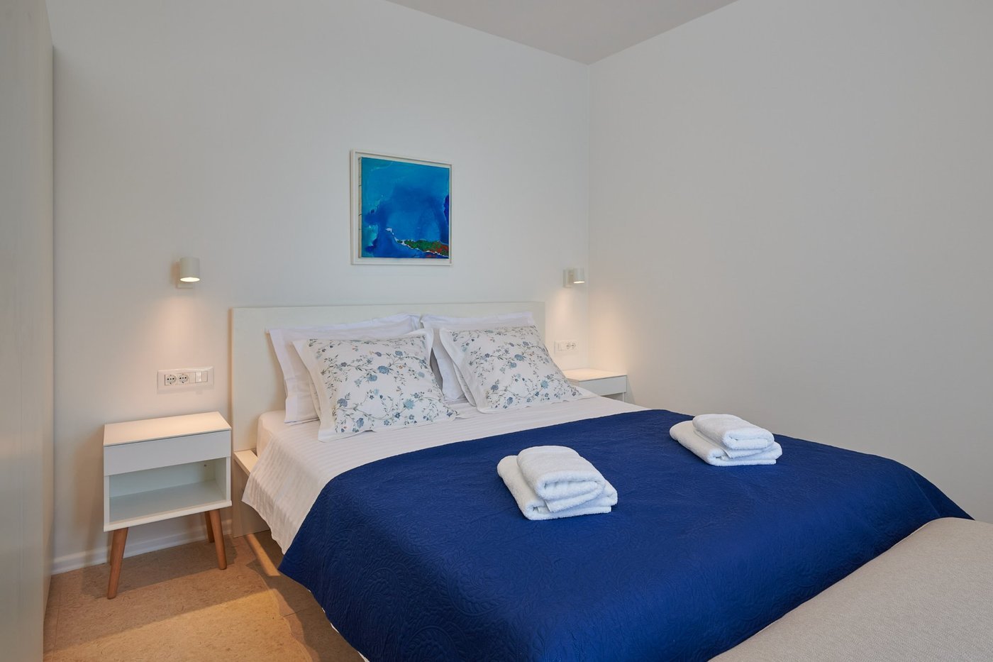 King bed with natural light and sea view