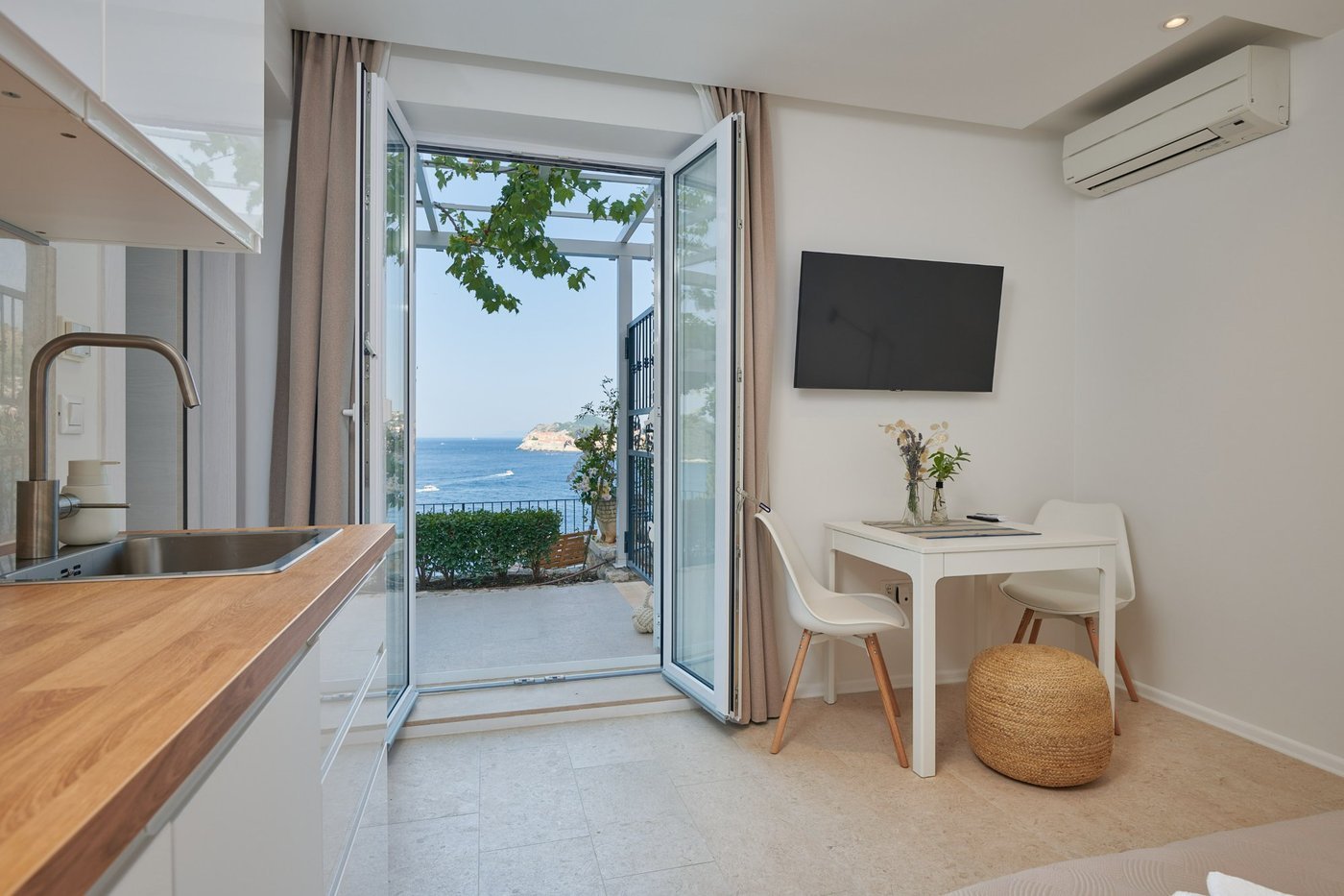 Open-plan living room with sea view